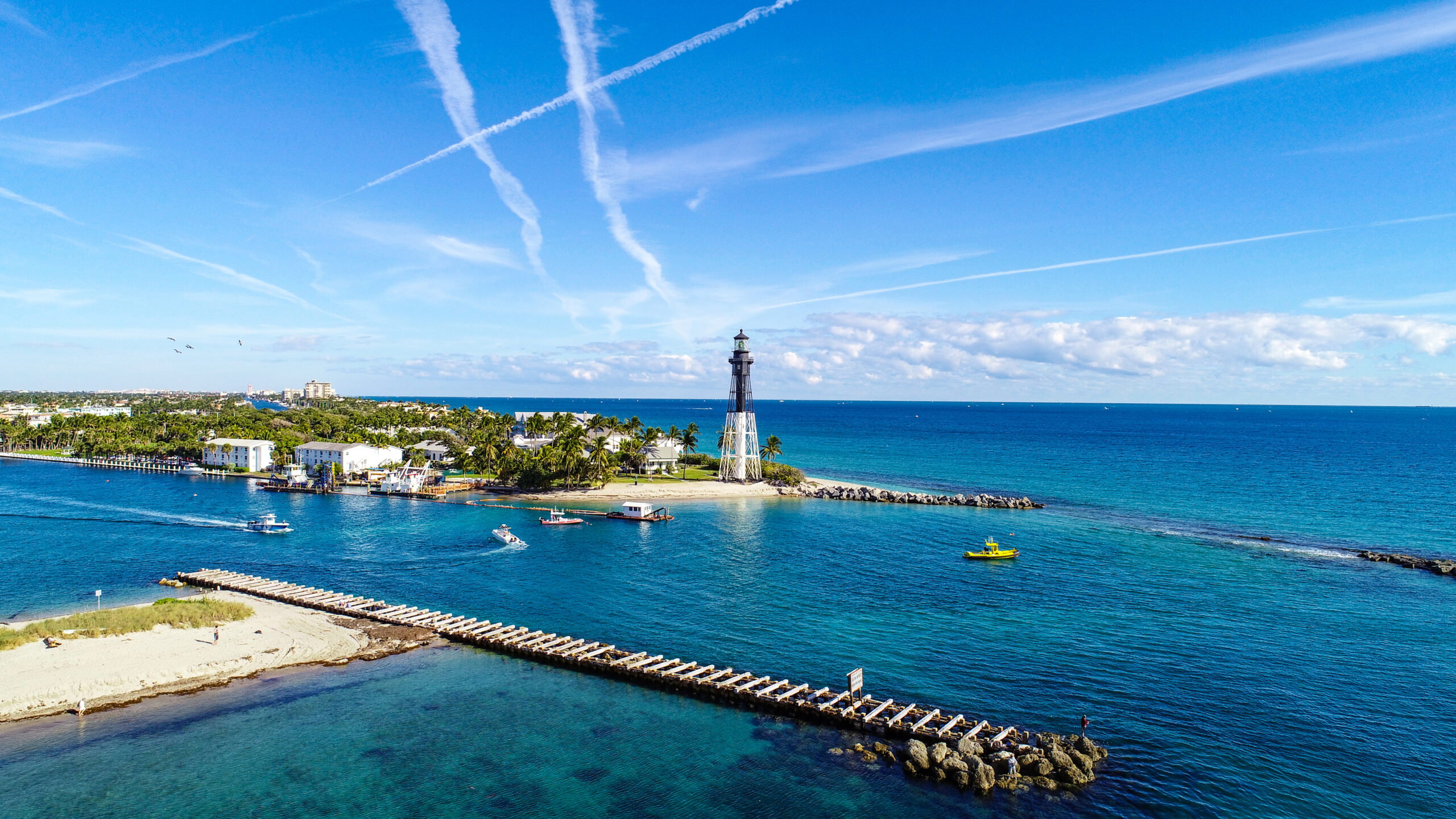 an aerial view of the Hillsboro Inlet and the historic Hillsboro Inlet Lighthouse