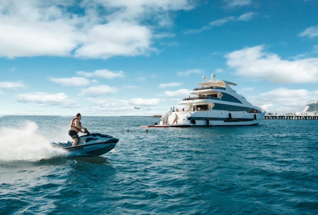 a man riding a jet ski on top of a body of water